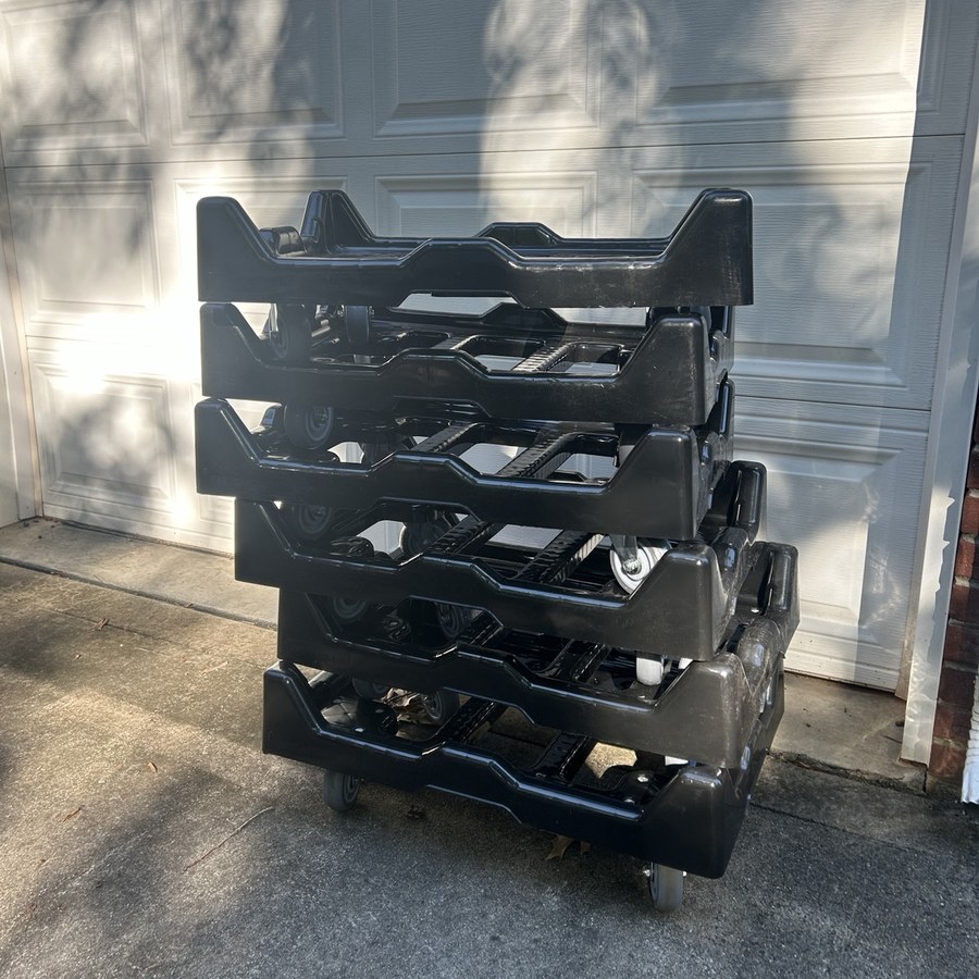 Stack of AGRentals low-profile moving dollies