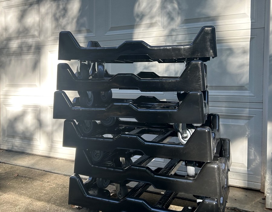 AGRentals low-profile moving dollies stacked and ready for rental