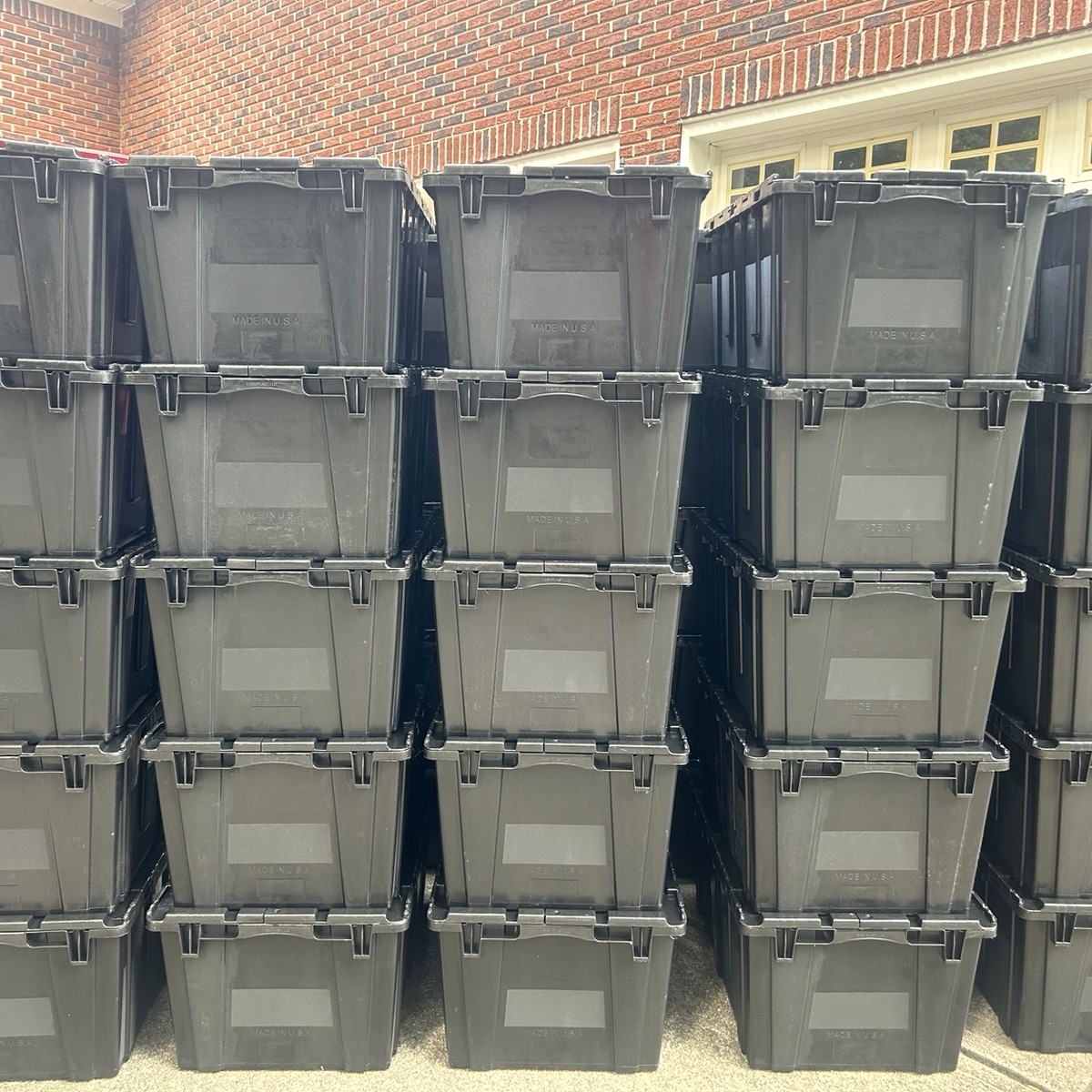 AGRentals reusable moving tote inventory stacked and ready for rental